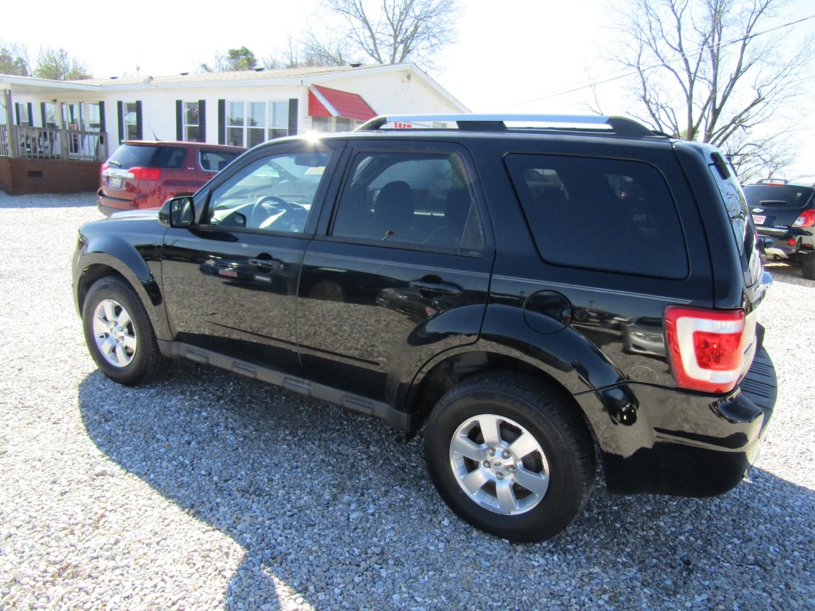 2010 Black Ford Escape Limited FWD (1FMCU0EG8AK) with an 3.0L V6 DOHC 24V engine, Automatic transmission, located at 15016 S Hwy 231, Midland City, AL, 36350, (334) 983-3001, 31.306210, -85.495277 - Photo #5